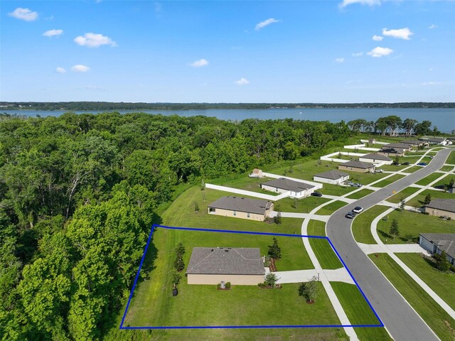 12952 Del Lago Dr, Astatula, FL 34705 - aerial overview of property's location featuring property boundaries highlighted and a nearby body of water