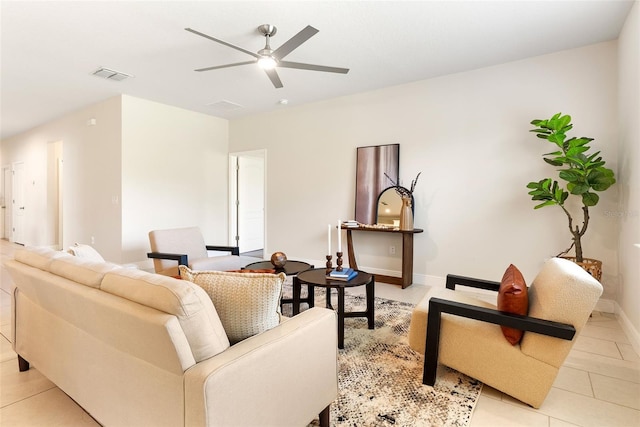 17112 Goldcrest Loop, Clermont, FL 34714 - living room with ceiling fan and light tile patterned floors