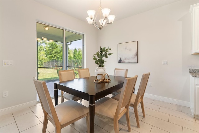 17112 Goldcrest Loop, Clermont, FL 34714 - dining room featuring a chandelier and light tile patterned flooring