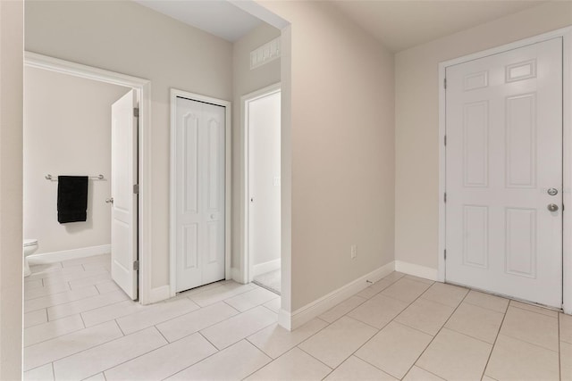 17112 Goldcrest Loop, Clermont, FL 34714 - entryway featuring light tile patterned flooring