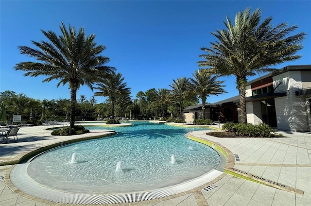 17112 Goldcrest Loop, Clermont, FL 34714 - community pool with a patio