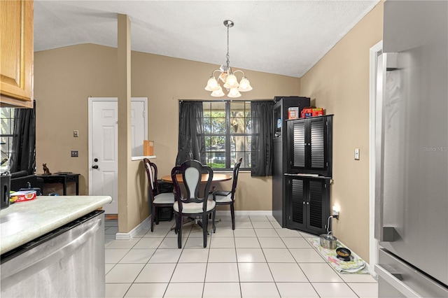 43 Almond Pass Dr, Ocala, FL 34472 - dining area featuring lofted ceiling, a chandelier, baseboards, and light tile patterned floors