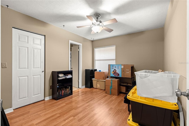 43 Almond Pass Dr, Ocala, FL 34472 - bedroom with light wood finished floors, ceiling fan, and baseboards