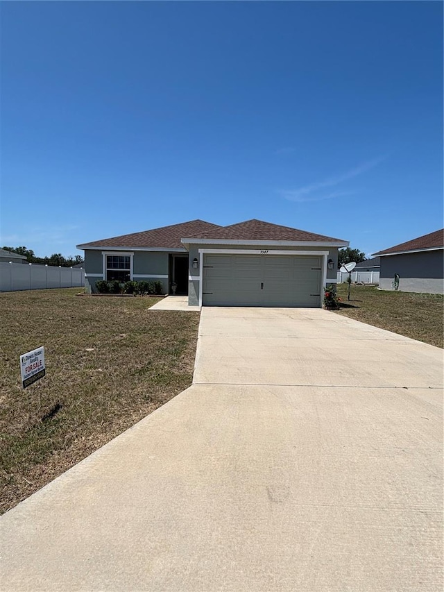 5547 SE 91st Pl, Ocala, FL 34480 - ranch-style home featuring a garage, concrete driveway, and stucco siding