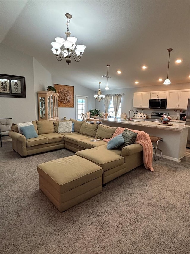 5547 SE 91st Pl, Ocala, FL 34480 - carpeted living room with a chandelier, lofted ceiling, a sink, and recessed lighting