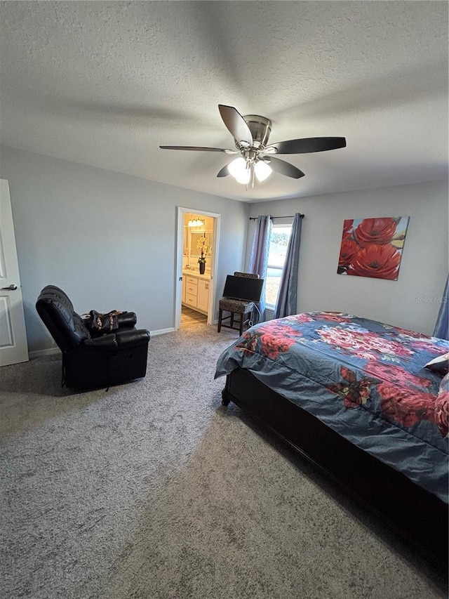 5547 SE 91st Pl, Ocala, FL 34480 - bedroom with carpet floors, ceiling fan, a textured ceiling, baseboards, and ensuite bath