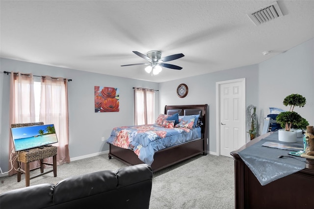 5547 SE 91st Pl, Ocala, FL 34480 - bedroom featuring carpet flooring, ceiling fan, and a textured ceiling