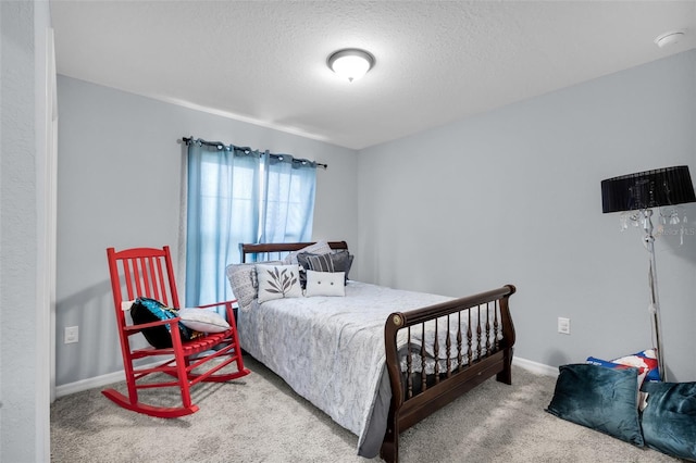 5547 SE 91st Pl, Ocala, FL 34480 - bedroom featuring a textured ceiling and carpet floors