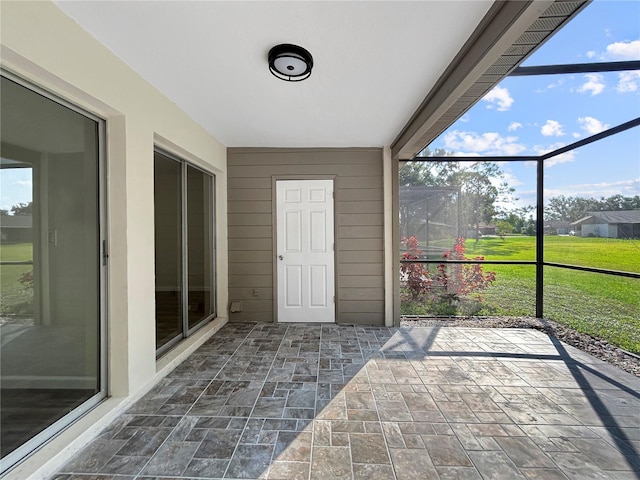 5136 Cedar Hammock Dr, Sarasota, FL 34232 - unfurnished sunroom with plenty of natural light