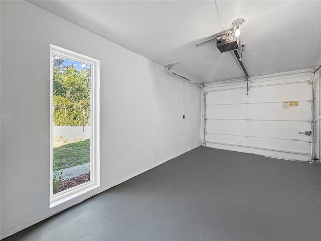 5136 Cedar Hammock Dr, Sarasota, FL 34232 - garage featuring a garage door opener
