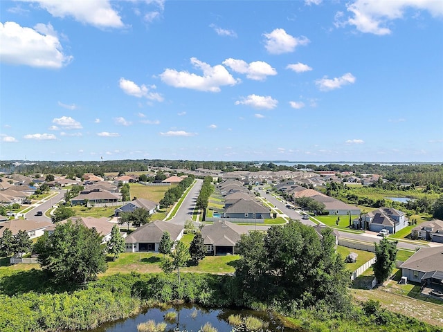440 Bellissimo Pl, Howey In The Hills, FL 34737 - aerial perspective of suburban area with a large body of water