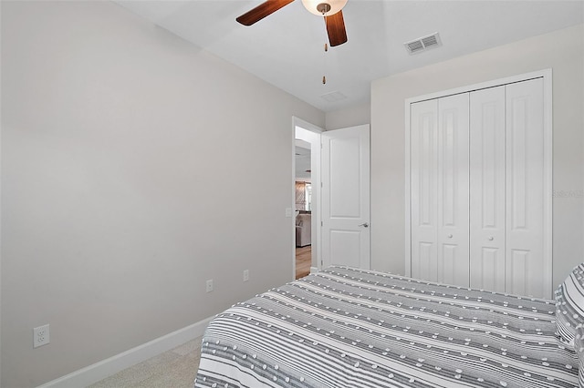 440 Bellissimo Pl, Howey In The Hills, FL 34737 - carpeted bedroom with baseboards, a closet, and ceiling fan