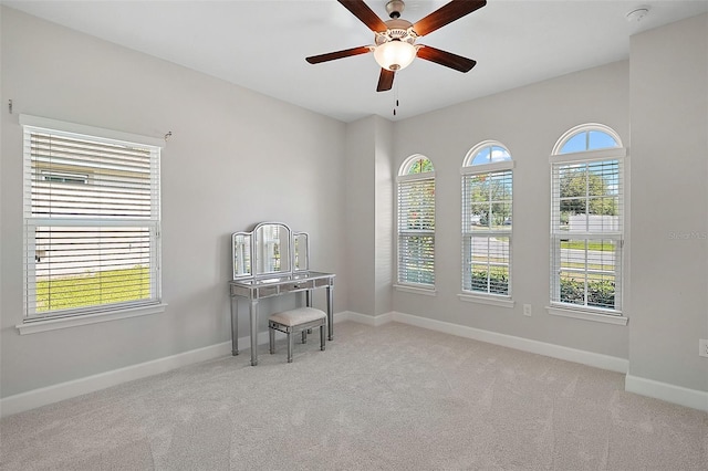 440 Bellissimo Pl, Howey In The Hills, FL 34737 - home office featuring carpet flooring, ceiling fan, and baseboards