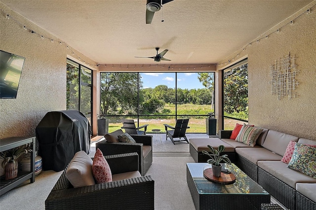 440 Bellissimo Pl, Howey In The Hills, FL 34737 - sunroom with a ceiling fan and an outdoor hangout area