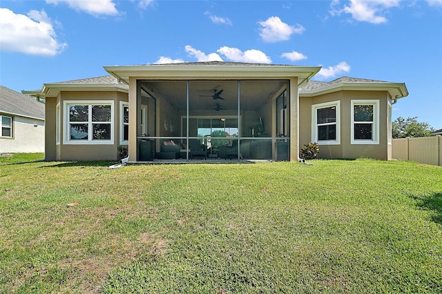 440 Bellissimo Pl, Howey In The Hills, FL 34737 - rear view of property with a sunroom, stucco siding, and ceiling fan