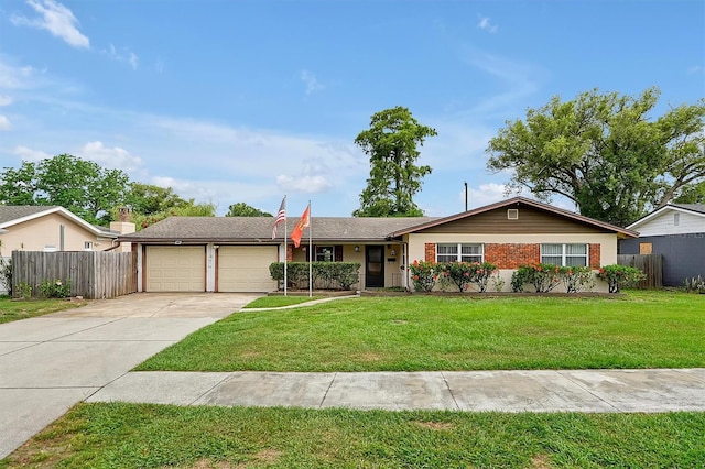2007 Mosher Dr, Orlando, FL 32810 - ranch-style house featuring a garage, concrete driveway, and brick siding