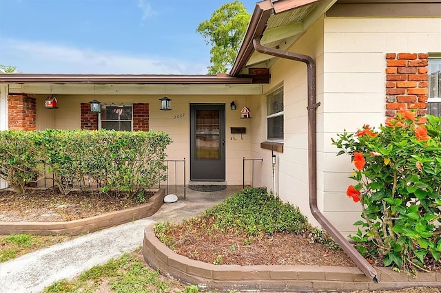 2007 Mosher Dr, Orlando, FL 32810 - doorway to property with a porch
