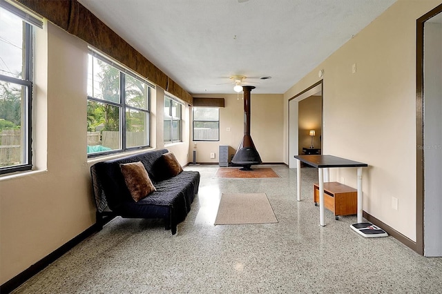 2007 Mosher Dr, Orlando, FL 32810 - sunroom featuring a wood stove
