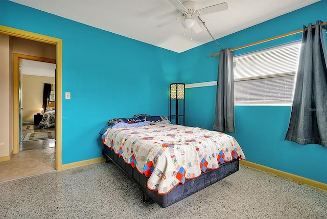 2007 Mosher Dr, Orlando, FL 32810 - bedroom with baseboards and ceiling fan