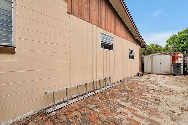 2007 Mosher Dr, Orlando, FL 32810 - view of side of home with a patio area