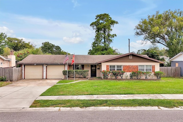 2007 Mosher Dr, Orlando, FL 32810 - ranch-style home with an attached garage and driveway