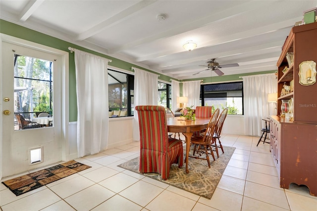 410 E Gulley Ave, Oakland, FL 34760 - dining space with beam ceiling, light tile patterned flooring, and ceiling fan