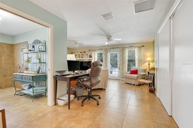 410 E Gulley Ave, Oakland, FL 34760 - office featuring light tile patterned floors, a ceiling fan, and a textured ceiling