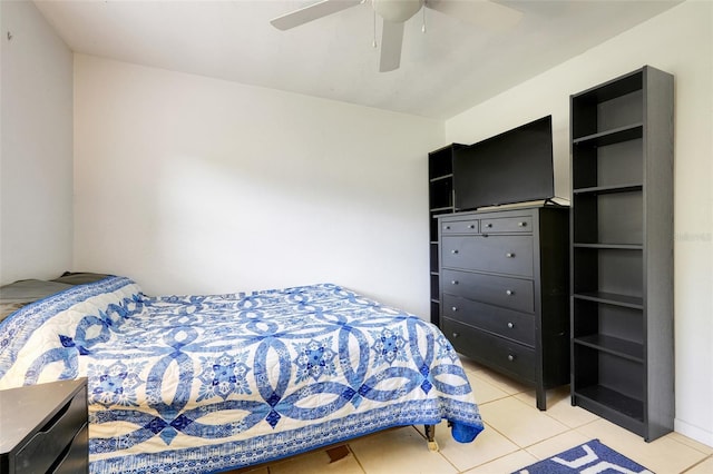 410 E Gulley Ave, Oakland, FL 34760 - bedroom featuring light tile patterned floors and a ceiling fan