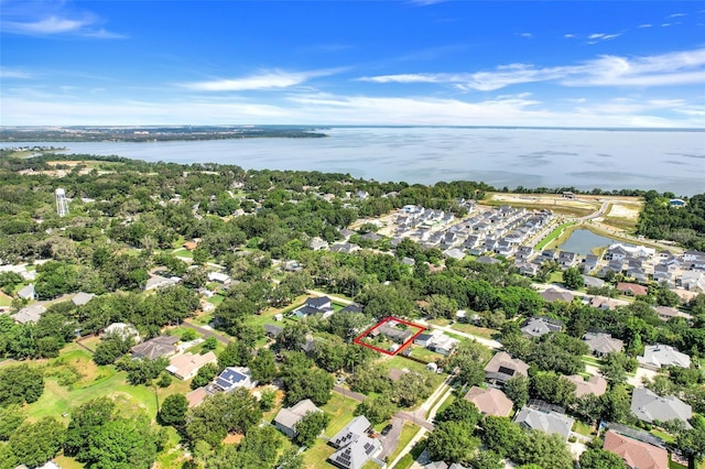 410 E Gulley Ave, Oakland, FL 34760 - aerial view of residential area featuring property parcel outlined and a nearby body of water
