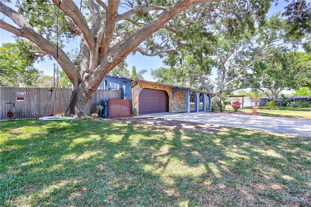 6443 34th Ave N, Saint Petersburg, FL 33710 - view of front of property with an attached garage and concrete driveway