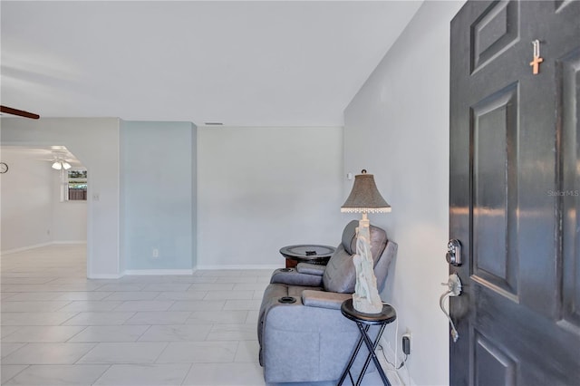 6443 34th Ave N, Saint Petersburg, FL 33710 - sitting room featuring a ceiling fan and baseboards