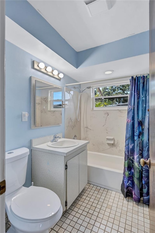 6443 34th Ave N, Saint Petersburg, FL 33710 - bathroom featuring shower / bath combination with curtain, vanity, and toilet
