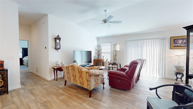 3817 Miragalia Ln, The Villages, FL 32163 - living area featuring ceiling fan, light wood finished floors, vaulted ceiling, and baseboards