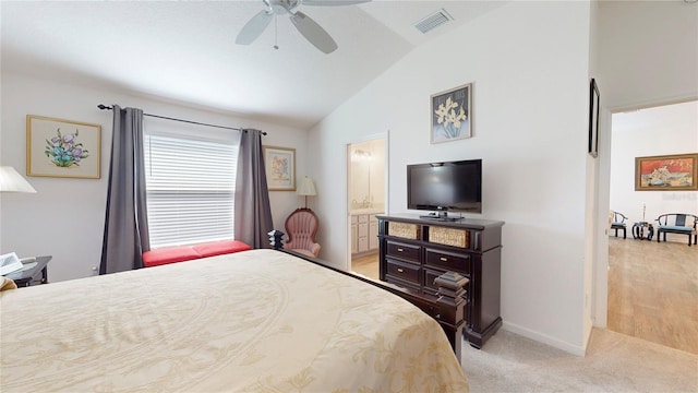3817 Miragalia Ln, The Villages, FL 32163 - bedroom with vaulted ceiling, ensuite bathroom, baseboards, and a ceiling fan