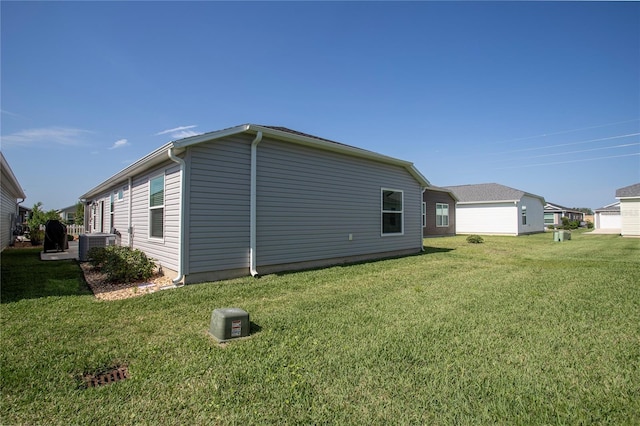 3817 Miragalia Ln, The Villages, FL 32163 - view of home's exterior with a yard and central AC unit