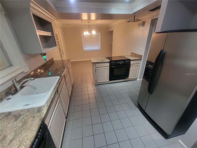6924 Nawadaha Blvd, Orlando, FL 32818 - kitchen featuring stainless steel fridge with ice dispenser, oven, tile patterned flooring, crown molding, and a peninsula