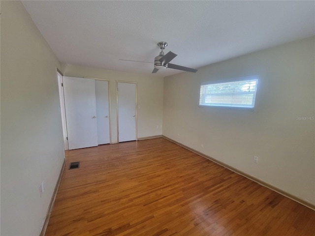 6924 Nawadaha Blvd, Orlando, FL 32818 - unfurnished bedroom with light wood-type flooring and a ceiling fan