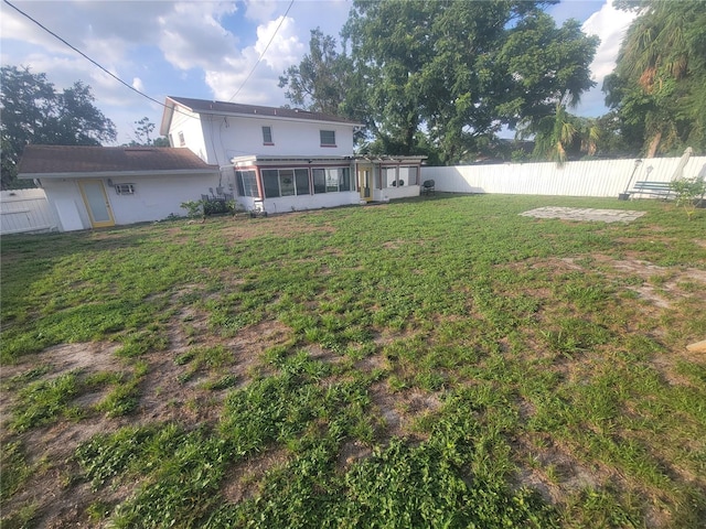 6924 Nawadaha Blvd, Orlando, FL 32818 - fenced backyard with a sunroom