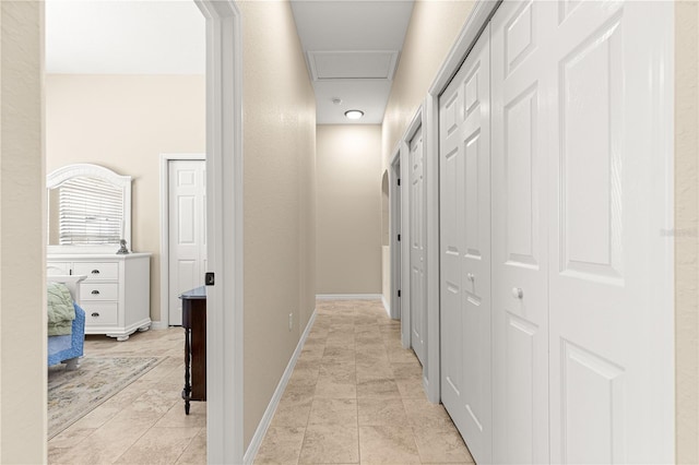 11215 SE 172nd Pl, Summerfield, FL 34491 - hallway with baseboards and light tile patterned flooring
