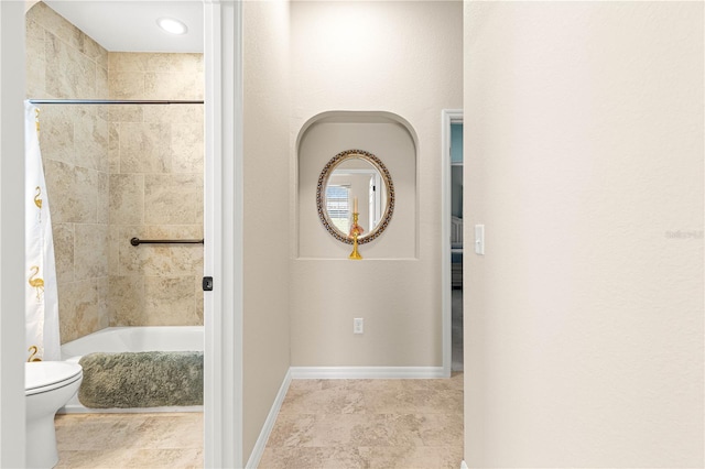 11215 SE 172nd Pl, Summerfield, FL 34491 - bathroom with toilet and shower / bath combo with shower curtain
