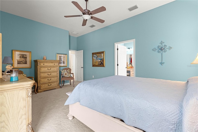 11215 SE 172nd Pl, Summerfield, FL 34491 - bedroom with light colored carpet and a ceiling fan