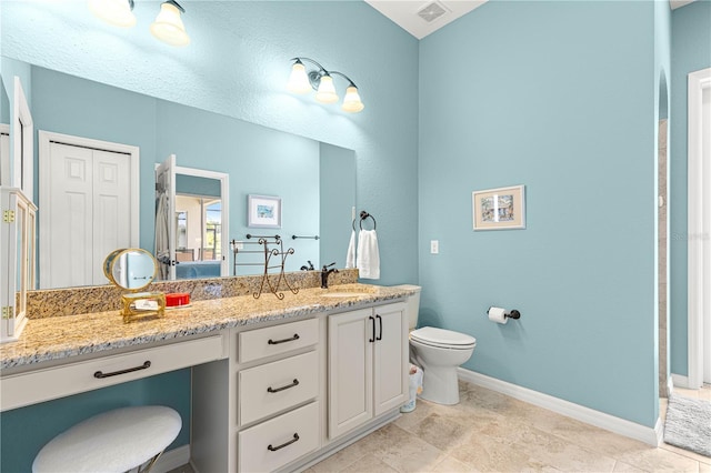 11215 SE 172nd Pl, Summerfield, FL 34491 - bathroom with double vanity and toilet