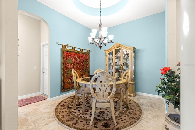 11215 SE 172nd Pl, Summerfield, FL 34491 - dining area with a chandelier and arched walkways