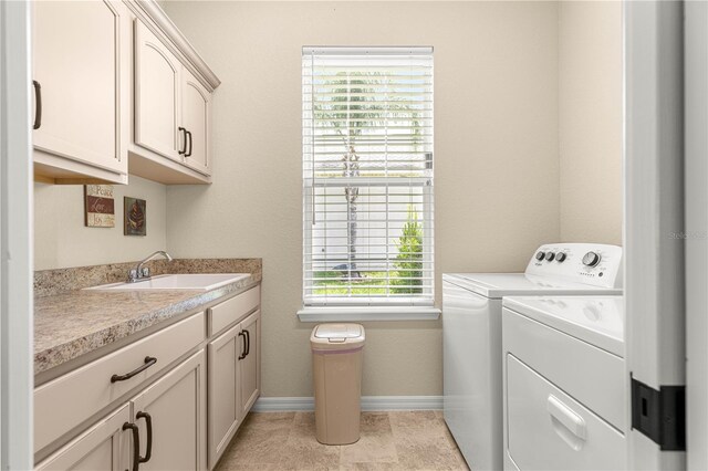 11215 SE 172nd Pl, Summerfield, FL 34491 - laundry area featuring washing machine and dryer and cabinet space
