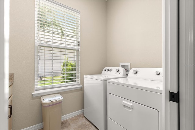11215 SE 172nd Pl, Summerfield, FL 34491 - laundry area featuring independent washer and dryer and baseboards