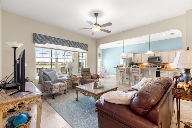 11215 SE 172nd Pl, Summerfield, FL 34491 - living area featuring a ceiling fan and light tile patterned floors