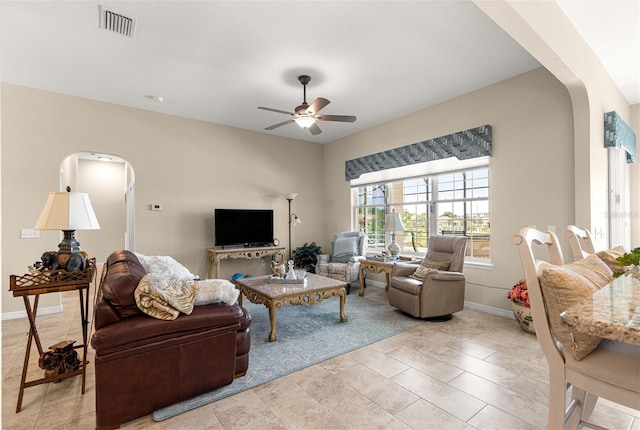 11215 SE 172nd Pl, Summerfield, FL 34491 - living area featuring arched walkways and a ceiling fan