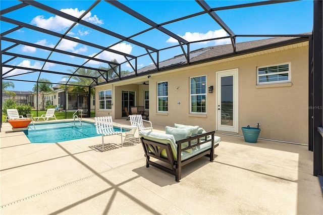 11215 SE 172nd Pl, Summerfield, FL 34491 - swimming pool featuring a patio area, an outdoor hangout area, a ceiling fan, and glass enclosure