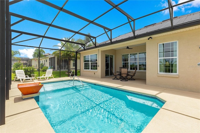 11215 SE 172nd Pl, Summerfield, FL 34491 - swimming pool with a patio area, glass enclosure, and a ceiling fan