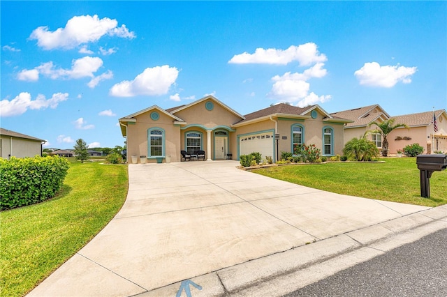 11215 SE 172nd Pl, Summerfield, FL 34491 - mediterranean / spanish house featuring driveway, stucco siding, an attached garage, and a front lawn